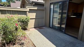 Gold River house for rent - a walkway in front of a house with a sliding glass door