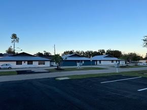 Lake Charles apartment for rent - a neighborhood with houses and a parking lot