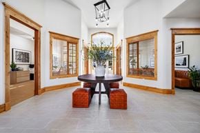Loveland apartment for rent - A dining room with a round table and four chairs.