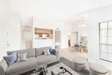 Westminster apartment for rent - A living room with a grey couch and a coffee table.