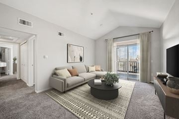 Westminster apartment for rent - A living room with a grey sofa and a coffee table.