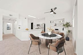 Westminster apartment for rent - A modern dining room with a round table and chairs.