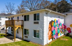 Atlanta apartment for rent - a house with a mural on the side of it