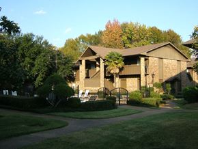 Jackson apartment for rent - a house in a neighborhood with a yard and a gate