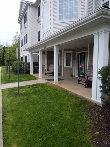 Williamsport apartment for rent - the front of a house with a walkway and lawn