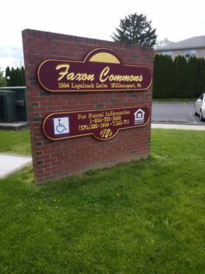 Williamsport apartment for rent - the sign in front of the leasing office for theea communities is shown