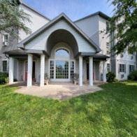 Bloomsburg apartment for rent - a mansion with a front porch and a lawn