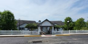 Bloomsburg apartment for rent - a white house with a white picket fence