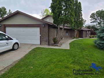 Billings house for rent - a home with a white car parked in the driveway