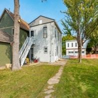 Mayer apartment for rent - an old house with a ladder on the side of it