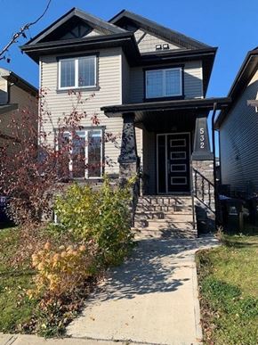 Fort Mcmurray apartment for rent - a house with a sidewalk in front of it