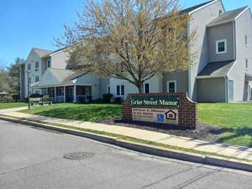 Williamsport apartment for rent - the street sign in front of an apartment building