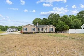 Richlands house for rent - a house with a large yard in front of it