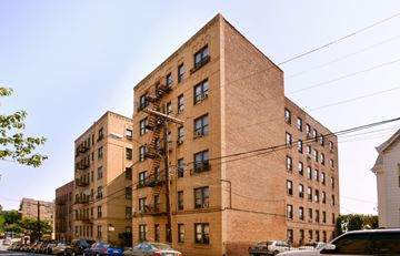 Yonkers apartment for rent - a large brick building on a city street