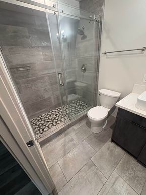 Imperial Beach apartment for rent - A bathroom with a walk-in shower and a toilet.