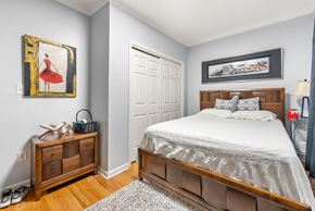 Jersey City apartment for rent - a bedroom with a bed and a dresser