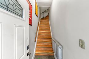 Jersey City apartment for rent - the stairway up to the second floor of a house