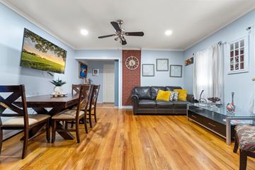 Jersey City apartment for rent - a living room and dining room with a couch and a table