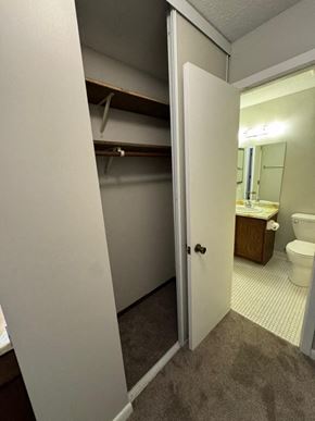 Little Canada house for rent - an empty bathroom with a toilet and a sink