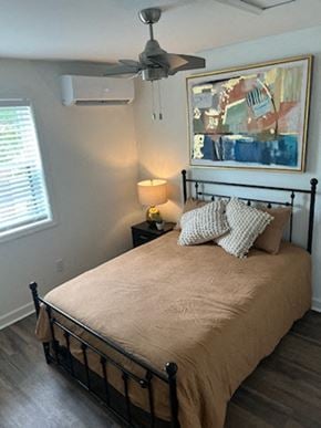 Durham apartment for rent - a bedroom with a bed and a ceiling fan