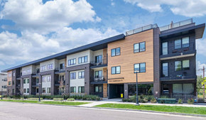 Denver apartment for rent - a rendering of a new apartment building on a city street