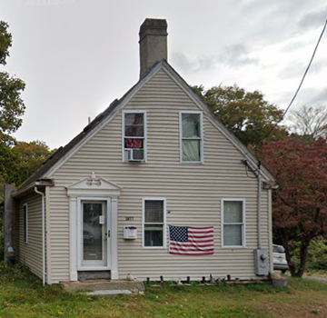 Abington house for rent - a house with an flag on the side of it