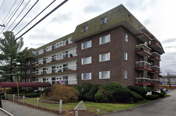 Quincy apartment for rent - an apartment building on the corner of a street