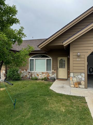 Pagosa Springs house for rent - a house with a lawn and a driveway