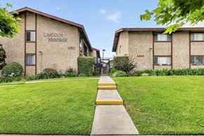 Anaheim apartment for rent - A building with the words "Lincoln Heritage" on it.