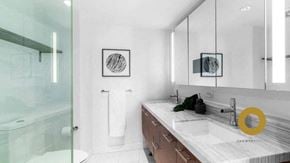 Vancouver house for rent - a white bathroom with a sink and a shower