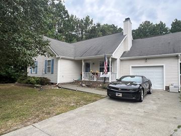 Youngsville house for rent - a car parked in a driveway in front of a house