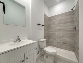 San Antonio apartment for rent - a bathroom with a toilet and a sink and a bath tub