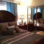 Columbus apartment for rent - a bedroom with a large bed and a mirror
