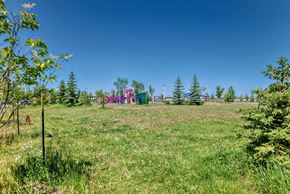 Edmonton house for rent - a park with a playground in the middle of a field
