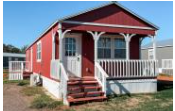 Shawnee house for rent - A red house with white trim and a porch.