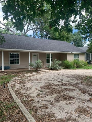 San Marcos house for rent - a house with a gravel driveway in front of it