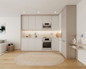 Long Island City apartment for rent - a white kitchen with white cabinets and a white rug