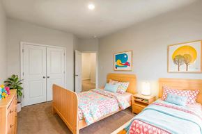Chambersburg apartment for rent - A bedroom with two beds and a dresser.