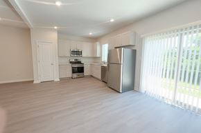 Chambersburg apartment for rent - A kitchen with a refrigerator, microwave, and oven.