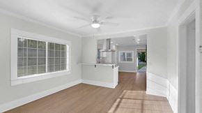 Fillmore house for rent - A room with a ceiling fan and a window.