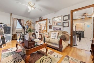 Irvington house for rent - a living room with a couch and a table     and a kitchen