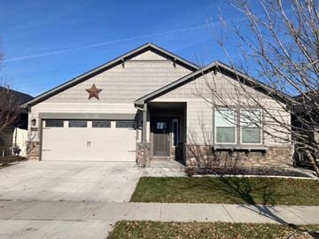 Boise house for rent - a white house with a star on the side of it