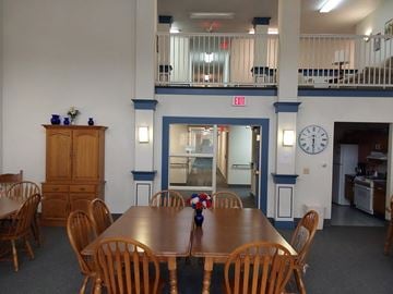 Oil City apartment for rent - a dining room with a wooden table and chairs