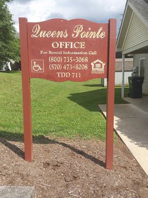 Northumberland apartment for rent - a sign for the owners panic office in front of a house