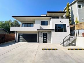 San Diego apartment for rent - A modern two-story house with a garage.
