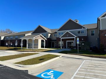 Lumberton apartment for rent - an image of an apartment building with a handicapped parking lot