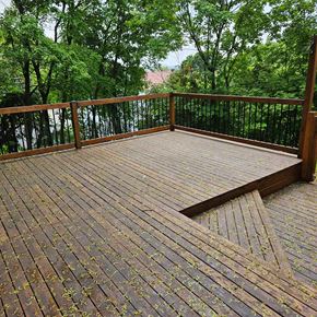 Sault Ste. Marie house for rent - a wooden deck with a view of the trees