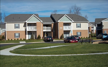 Kings Mountain apartment for rent - an apartment building with cars parked in front of it