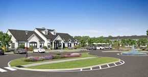 Patchogue apartment for rent - a rendering of a house with a parking lot and fountain