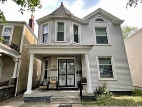 Louisville apartment for rent - a renovated house with a front porch and a front door